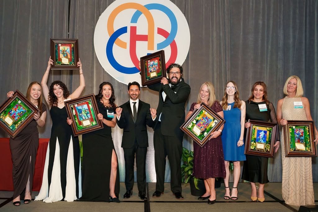 The Lifedge team and fellow honorees celebrating on stage at the 2026 awards gala